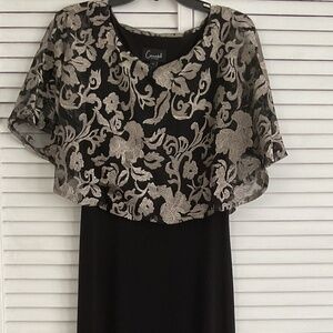 Black gown, gold top